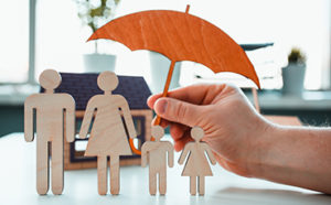 umbrella over family